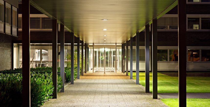 Roofed Office Building Entrance At Night